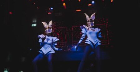 Starmuse Entertainment LED dancers performing in illuminated futuristic costumes at an event in Toronto.