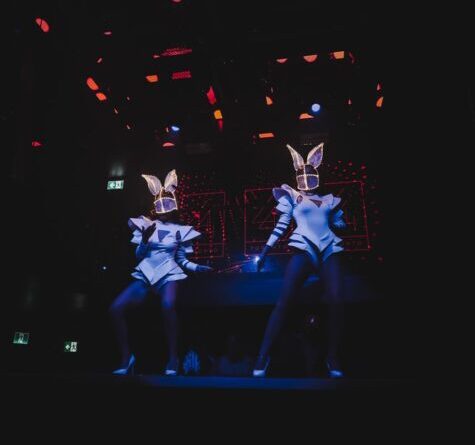 Starmuse Entertainment LED dancers performing in illuminated futuristic costumes at an event in Toronto.