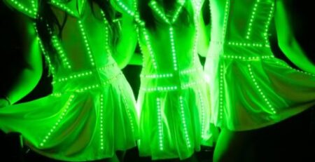 LED dancers in Toronto wearing glowing green illuminated costumes – Starmuse Entertainment