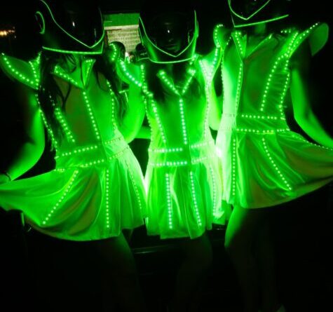 LED dancers in Toronto wearing glowing green illuminated costumes – Starmuse Entertainment